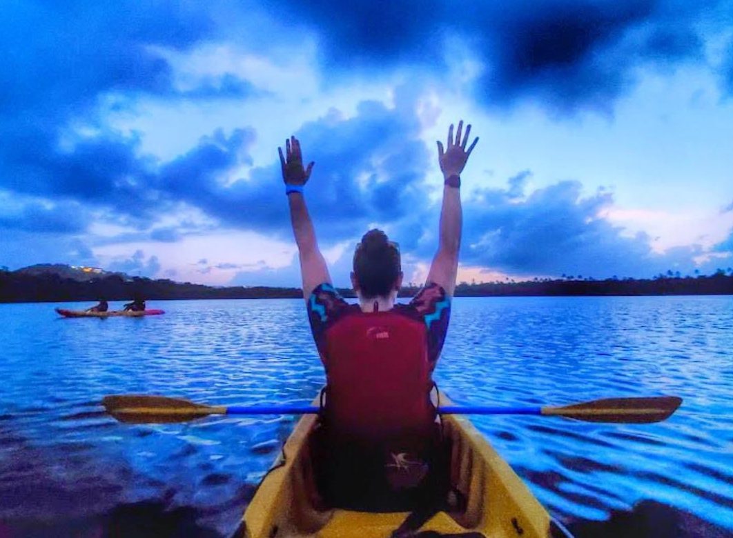 bb9 a person standing in front of a body of water