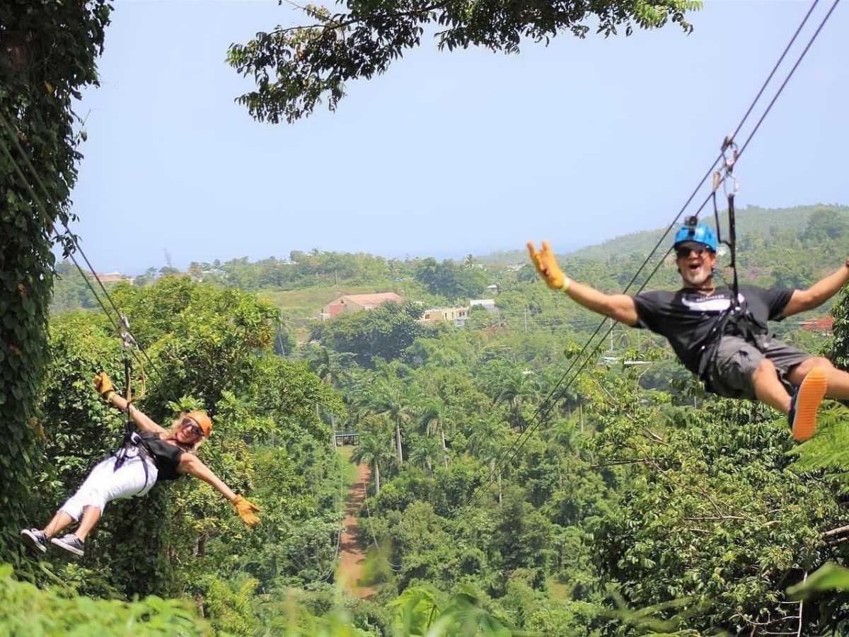 a man flying through the air while riding skis