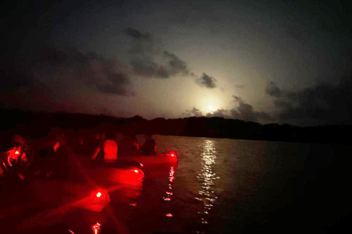 a group of clouds in the dark