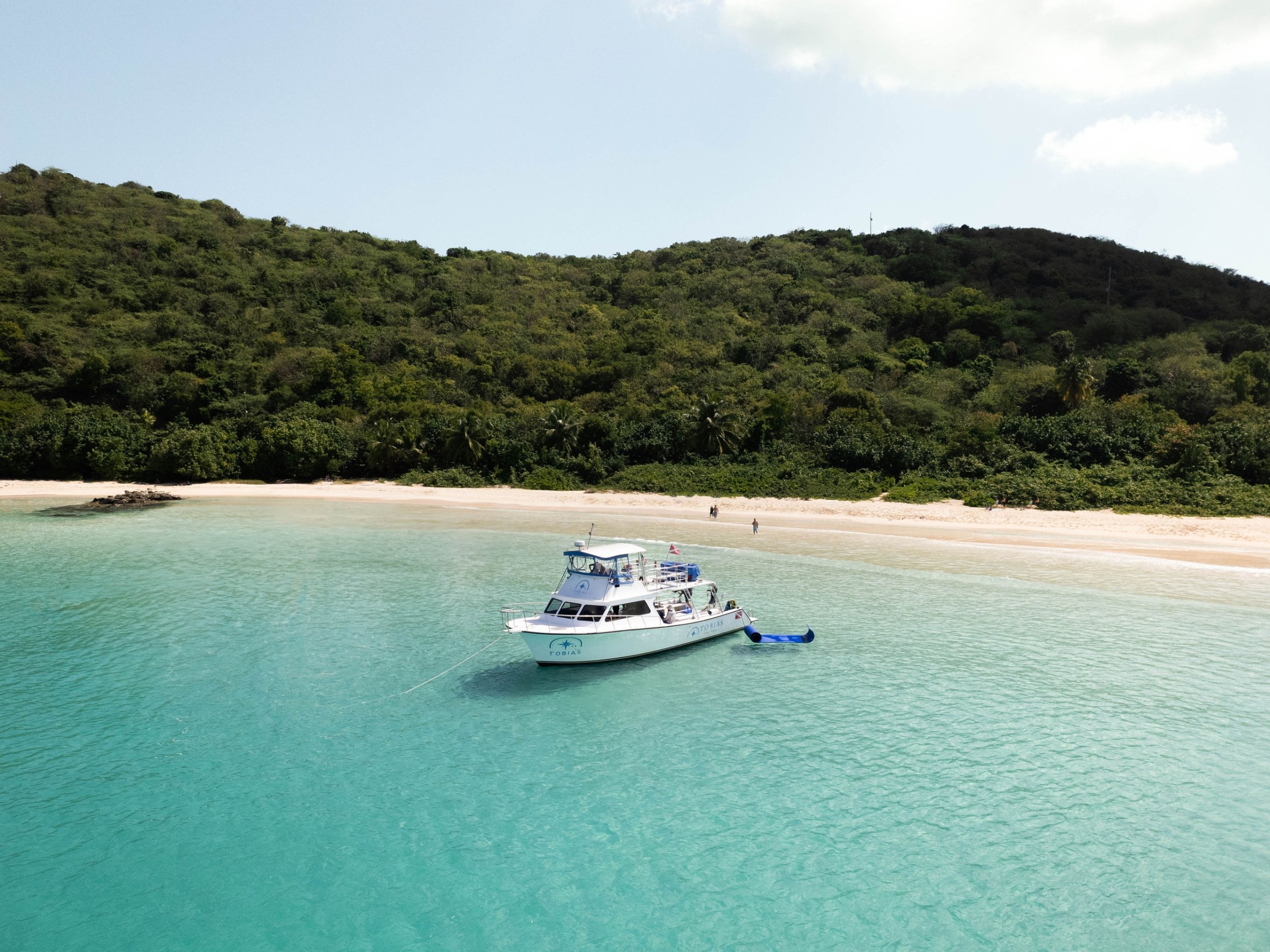 a small boat in a body of water