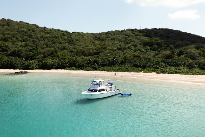 a small boat in a body of water